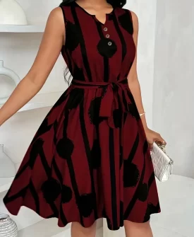women's elegant sleeveless belted dress